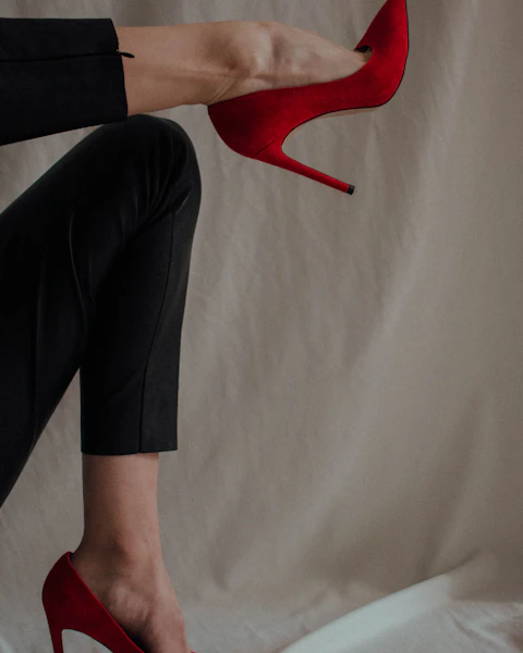 Red stilettos and a leg crossed high, ready for the car: escort and GFE dates in London